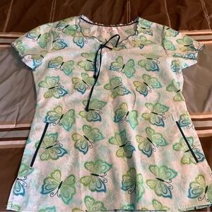 Peaches scrub top size M
